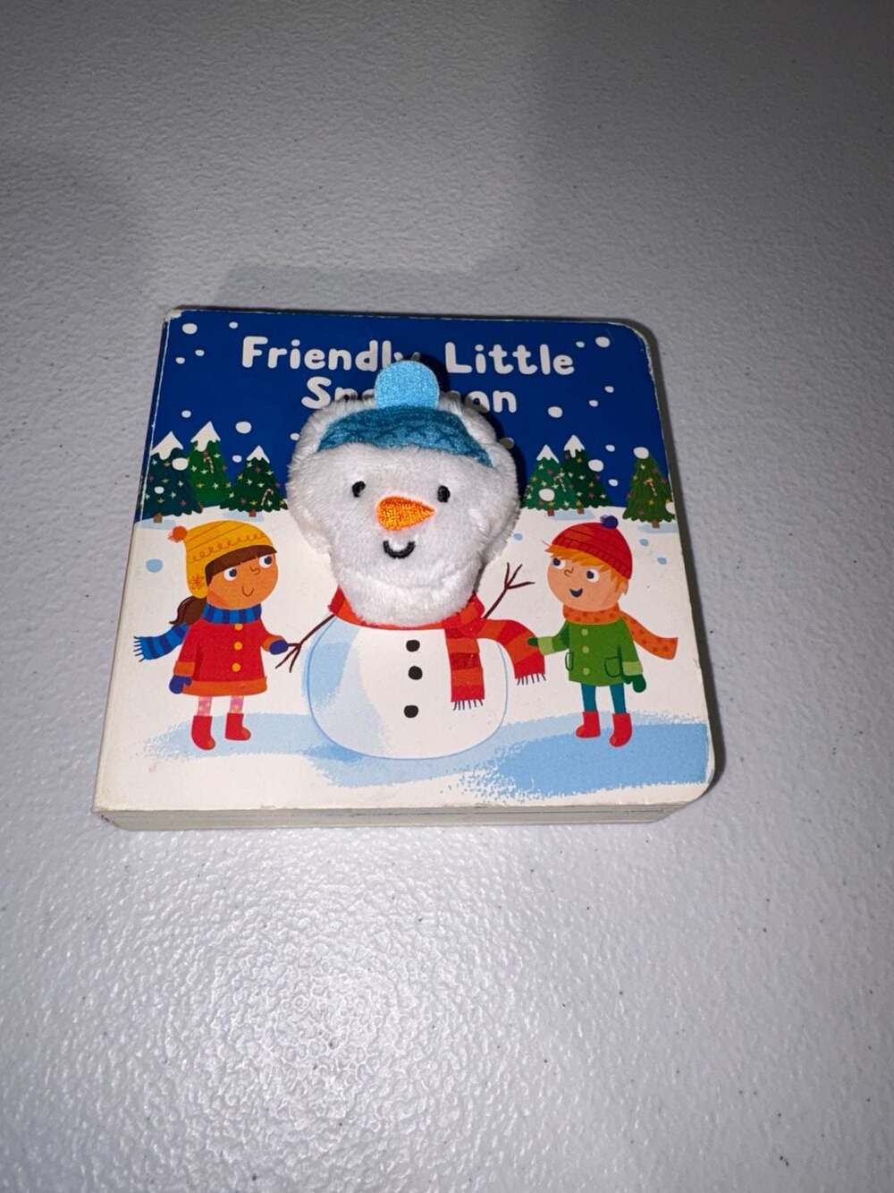 Friendly Little Snowman Finger Puppet Board Book by Samantha Meredith